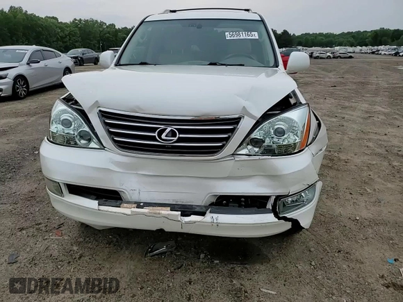 2009 Lexus GX 470 z VIN JTJBT20X690177574, wystawiony jako Copart lot #56981165 z przebiegiem 167 415 mil mil oraz Szkoda całkowita • Salvage title. Historia ofert i sprzedaży dostępna na DreamBid. Obrazek 14.