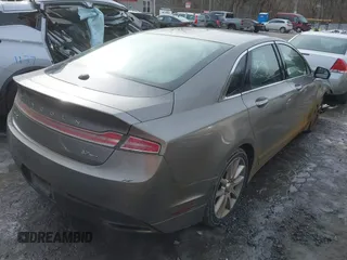 2015 Lincoln MKZ z VIN 3LN6L2JK4FR610596, wystawiony jako IAAI lot #41443285 z przebiegiem 114 363 mil mil oraz . Historia ofert i sprzedaży dostępna na DreamBid. Obrazek 4.