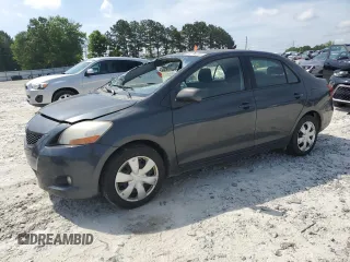 2009 Toyota Yaris z VIN JTDBT903291313024, wystawiony jako Copart lot #54714205 z przebiegiem 338 203 mil mil oraz Szkody całkowita. Historia ofert i sprzedaży dostępna na DreamBid. Obrazek 1.