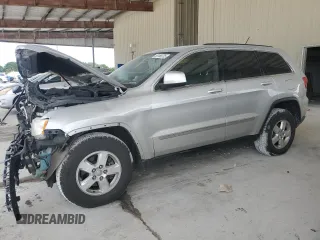 2013 Jeep Grand Cherokee Laredo с VIN 1C4RJFAG9DC634561, выставлен на аукционе Copart как лот 55180235 с пробегом 184 774 миль миль и Списание • Salvage title. История ставок и продаж доступна на DreamBid. Изображение 1.