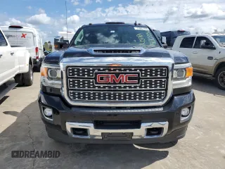 2018 GMC Sierra 3500HD Denali z VIN 1GT42YEY9JF273249, wystawiony jako Copart lot #74801154 z przebiegiem Nie podano mil oraz Nie do naprawy. Historia ofert i sprzedaży dostępna na DreamBid. Obrazek 5.