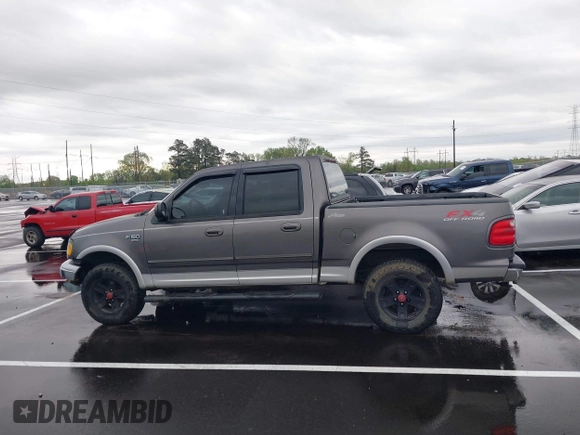 2003 Ford F-150 XLT with VIN 1FTRW08L43KD25506, listed as a IAAI auction lot 41941847 with 1 mi miles. Bid and sale history available at carsss.com. Image 14.