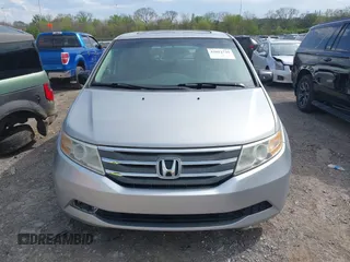 2012 Honda Odyssey EX-L with VIN 5FNRL5H68CB131431, listed as a IAAI auction lot 42012749 with 245,649 mi miles and . Bid and sale history available at carsss.com. Image 12.