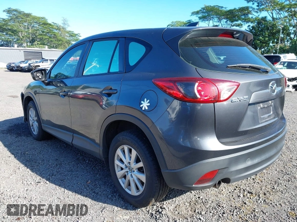 2014 Mazda CX-5 Sport with VIN JM3KE2BE8E0313407, listed as a IAAI auction lot 41215428 with 120,387 mi miles and . Bid and sale history available at carsss.com. Image 3.