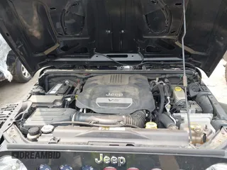 2015 Jeep Wrangler Unlimited Sahara with VIN 1C4HJWEG3FL661568, listed as a IAAI auction lot 42387810 with 140,927 mi miles and . Bid and sale history available at DreamBid. Image 10.