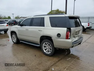 2017 GMC Yukon SLE with VIN 1GKS1AKC8HR125018, listed as a Copart auction lot 79841144 with 168,479 mi miles and Salvage Title. Bid and sale history available at carsss.com. Image 2.