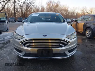 2018 Ford Fusion SE z VIN 3FA6P0LU4JR269064, wystawiony jako IAAI lot #41222967 z przebiegiem 115 077 mil mil oraz . Historia ofert i sprzedaży dostępna na DreamBid. Obrazek 13.