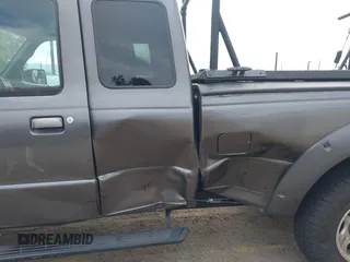2011 Ford Ranger XL with VIN 1FTKR1EE4BPA46997, listed as a IAAI auction lot 41471483 with 217,874 mi miles. Bid and sale history available at carsss.com. Image 6.