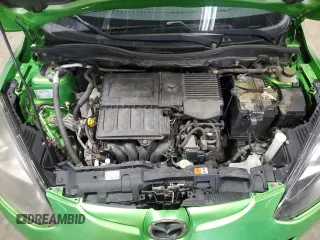 2012 Mazda 2 Sport with VIN JM1DE1KY9C0151578, listed as a Copart auction lot 52625055 with 123,812 mi miles and Salvage Title. Bid and sale history available at DreamBid. Image 11.