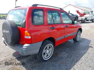 2003 Chevrolet Tracker z VIN 2CNBJ13C636944393, wystawiony jako IAAI lot #42280665 z przebiegiem 80 918 mil mil oraz . Historia ofert i sprzedaży dostępna na DreamBid. Obrazek 4.