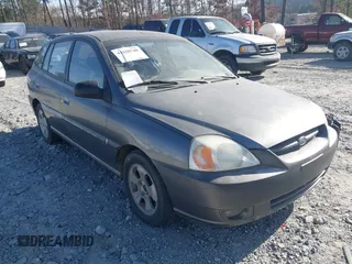 2004 Kia Rio with VIN KNADC165246223044, listed as a IAAI auction lot 41820748 with 119,857 mi miles. Bid and sale history available at carsss.com. Image 1.