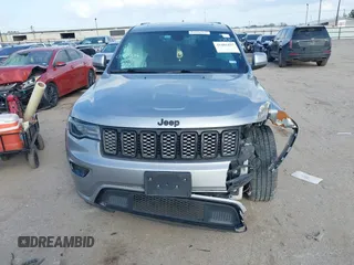 2020 Jeep Grand Cherokee Altitude with VIN 1C4RJEAGXLC403693, listed as a IAAI auction lot 41482425 with 67,161 mi miles and . Bid and sale history available at DreamBid. Image 12.