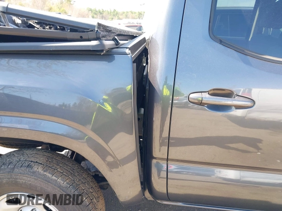 2023 Toyota Tacoma SR with VIN 3TMCZ5AN0PM614127, listed as a IAAI auction lot 41974924 with 12,674 mi miles and . Bid and sale history available at DreamBid. Image 19.