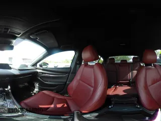 2024 Mazda 3 S Carbon Edition with VIN 3MZBPBCM2RM403824, listed as a IAAI auction lot 42612315 with 8,261 mi miles and . Bid and sale history available at DreamBid. Image 19.