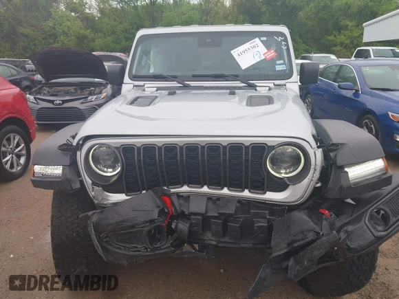 2024 Jeep Wrangler Rubicon with VIN 1C4PJXFG7RW252959, listed as a IAAI auction lot 41955302 with 27,727 mi miles and . Bid and sale history available at DreamBid. Image 12.