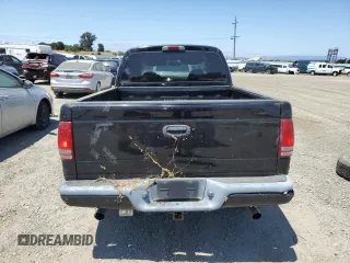 2001 Dodge Dakota Sport z VIN 1B7HG2AN61S316996, wystawiony jako Copart lot #58677535 z przebiegiem 164 628 mil mil oraz Tytuł czysty. Historia ofert i sprzedaży dostępna na DreamBid. Obrazek 6.