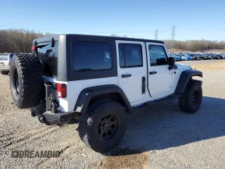 2012 Jeep Wrangler Unlimited Sport with VIN 1C4BJWDG2CL257437, listed as a Copart auction lot 49257965 with 141,695 mi miles and Clean title. Bid and sale history available at DreamBid. Image 3.