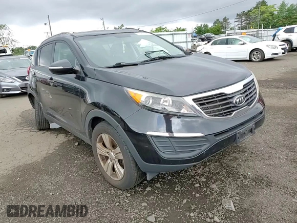 2011 Kia Sportage LX with VIN KNDPBCA24B7012852, listed as a Copart auction lot 63837085 with 186,805 mi miles and Salvage title. Bid and sale history available at DreamBid. Image 14.