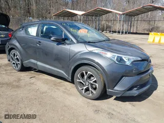 2019 Toyota C-HR XLE with VIN NMTKHMBX7KR084870, listed as a IAAI auction lot 41700043 with 34,793 mi miles. Bid and sale history available at carsss.com. Image 1.