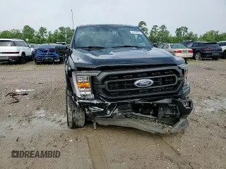 2023 Ford F-150 XL with VIN 1FTEW1C59PFC27499, listed as a Copart auction lot 54453255 with 58,554 mi miles and Salvage title. Bid and sale history available at DreamBid. Image 13.