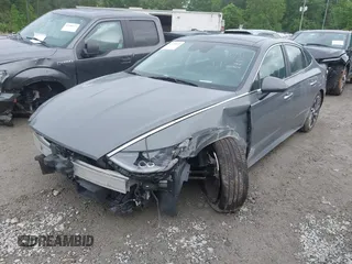 2022 Hyundai Sonata Limited z VIN KMHL34J23NA203604, wystawiony jako IAAI lot #42120512 z przebiegiem 55 529 mil mil oraz . Historia ofert i sprzedaży dostępna na DreamBid. Obrazek 2.