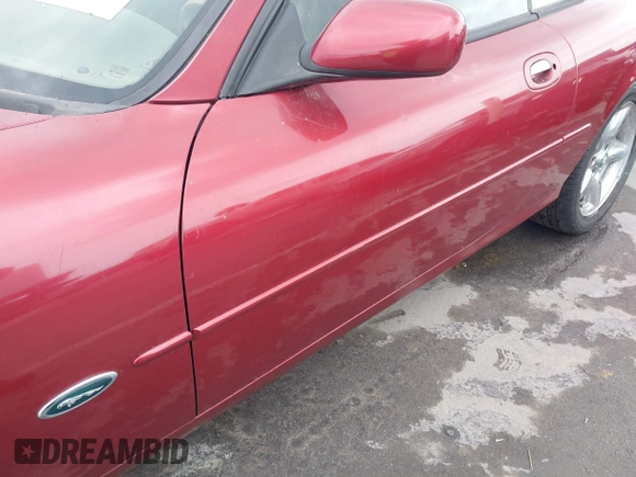 1997 Jaguar XK with VIN SAJGX2745VC017589, listed as a IAAI auction lot 42208129 with Not Provided miles and . Bid and sale history available at DreamBid. Image 6.
