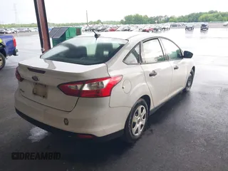 2012 Ford Focus S with VIN 1FAHP3E24CL254409, listed as a IAAI auction lot 42166880 with 123,981 mi miles and . Bid and sale history available at DreamBid. Image 4.