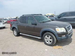 2007 Ford Explorer Sport Trac XLT with VIN 1FMEU31K77UA17534, listed as a IAAI auction lot 41863959 with 216,908 mi miles. Bid and sale history available at carsss.com. Image 1.