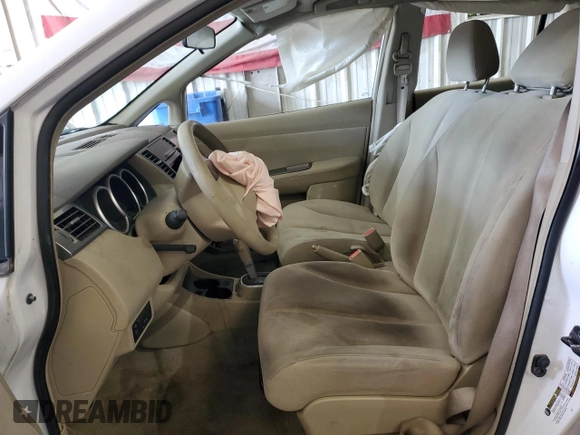 2009 Nissan Versa S with VIN 3N1BC13E99L483911, listed as a Copart auction lot 51591235 with Not Provided miles and Salvage Title. Bid and sale history available at DreamBid. Image 7.