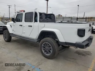 2023 Jeep Gladiator Overland z VIN 1C6HJTFG6PL516742, wystawiony jako Copart lot #65762465 z przebiegiem Nie podano mil oraz Szkoda całkowita • Salvage title. Historia ofert i sprzedaży dostępna na DreamBid. Obrazek 2.