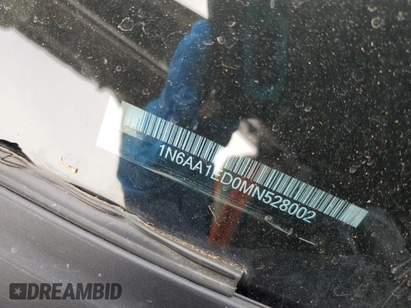 2021 Nissan Titan Pro-4X with VIN 1N6AA1ED0MN528002, listed as a Copart auction lot 54779885 with 33,235 mi miles and Salvage title. Bid and sale history available at DreamBid. Image 12.