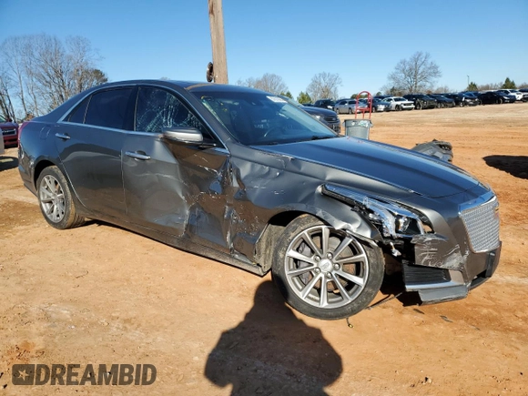 2017 Cadillac CTS Luxury AWD with VIN 1G6AX5SX9H0133510, listed as a Copart auction lot 87673055 with 106,797 mi miles and Salvage title. Bid and sale history available at DreamBid. Image 4.