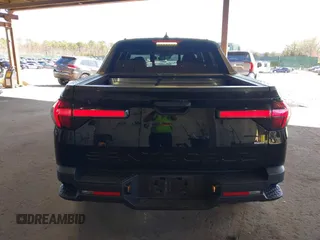 2022 Hyundai Santa Cruz SEL z VIN 5NTJCDAE7NH018858, wystawiony jako IAAI lot #42038182 z przebiegiem 28 596 mil mil oraz . Historia ofert i sprzedaży dostępna na DreamBid. Obrazek 17.