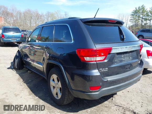 2013 Jeep Grand Cherokee Laredo with VIN 1C4RJFAG1DC592371, listed as a IAAI auction lot 42064993 with 136,154 mi miles. Bid and sale history available at carsss.com. Image 3.