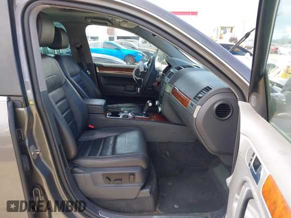 2010 Volkswagen Touareg VR6 with VIN WVGBF7A96AD002466, listed as a IAAI auction lot 41709052 with 204,819 mi miles and . Bid and sale history available at DreamBid. Image 5.