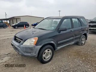 2002 Honda CR-V LX z VIN JHLRD68472C024693, wystawiony jako Copart lot #57076495 z przebiegiem 294 743 mil mil oraz Czysty tytuł • Clean title. Historia ofert i sprzedaży dostępna na DreamBid. Obrazek 1.