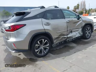 2019 Lexus RX with VIN 2T2BGMCA9KC033583, listed as a IAAI auction lot 41507244 with 67,484 mi miles. Bid and sale history available at carsss.com. Image 4.