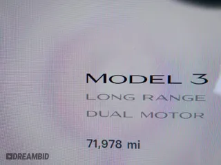2021 Tesla Model 3 Long Range with VIN 5YJ3E1EB6MF878411, listed as a IAAI auction lot 41986947 with 71,978 mi miles. Bid and sale history available at carsss.com. Image 16.