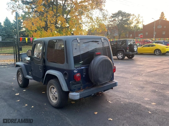 2003 Jeep Wrangler SE with VIN 1J4FA29143P371506, listed as a Copart auction lot 80153184 with 101,513 mi miles and Clean Title. Bid and sale history available at carsss.com. Image 3.