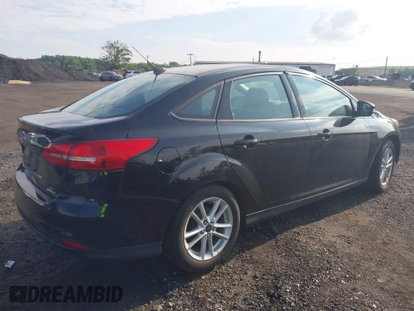 2016 Ford Focus SE with VIN 1FADP3F26GL204663, listed as a IAAI auction lot 42664653 with 138,141 mi miles and . Bid and sale history available at DreamBid. Image 4.