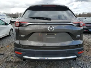 2016 Mazda CX-9 Grand Touring z VIN JM3TCBDY2G0114342, wystawiony jako Copart lot #49883325 z przebiegiem 41 716 mil mil oraz Czysty tytuł • Clean title. Historia ofert i sprzedaży dostępna na DreamBid. Obrazek 6.