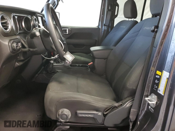 2023 Jeep Gladiator Overland z VIN 1C6HJTFGXPL560873, wystawiony jako Copart lot #47033235 z przebiegiem Nie podano mil oraz Czysty tytuł • Clean title. Historia ofert i sprzedaży dostępna na DreamBid. Obrazek 7.