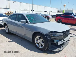 2022 Dodge Charger SXT with VIN 2C3CDXBG7NH204659, listed as a IAAI auction lot 41882695 with 49,773 mi miles and . Bid and sale history available at DreamBid. Image 1.
