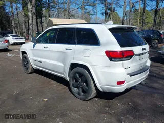 2015 Jeep Grand Cherokee Altitude with VIN 1C4RJFAG4FC924869, listed as a IAAI auction lot 41656444 with 112,786 mi miles. Bid and sale history available at carsss.com. Image 3.