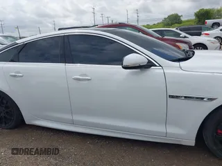 2014 Jaguar XJ R with VIN SAJWA1EK3EMV58692, listed as a IAAI auction lot 42663979 with 111,386 mi miles and . Bid and sale history available at DreamBid. Image 13.