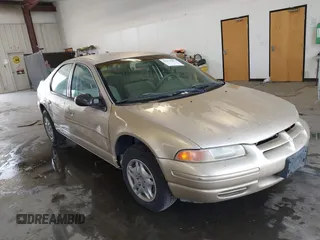 1999 Dodge Stratus z VIN 1B3EJ46X6XN587172, wystawiony jako IAAI lot #42472893 z przebiegiem 154 338 mil mil oraz . Historia ofert i sprzedaży dostępna na DreamBid. Obrazek 1.
