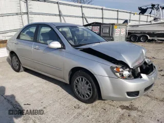 2009 Kia Spectra LX with VIN KNAFE221895659552, listed as a Copart auction lot 82555924 with 114,704 mi miles and Salvage Title. Bid and sale history available at carsss.com. Image 4.