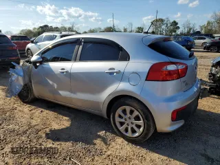 2016 Kia Rio LX with VIN KNADM5A34G6666911, listed as a Copart auction lot 50010045 with 75,479 mi miles and Salvage Title. Bid and sale history available at DreamBid. Image 2.