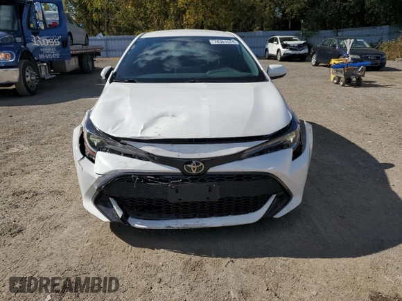 2019 Toyota Corolla Hatchback SE with VIN JTNK4RBEXK3011658, listed as a Copart auction lot 74301574 with 98,486 mi miles and Clean Title. Bid and sale history available at carsss.com. Image 5.