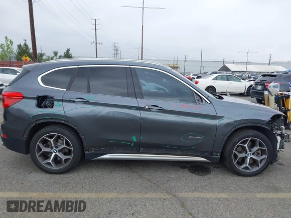 2016 BMW X1 xDrive28i with VIN WBXHT3C32GP886084, listed as a IAAI auction lot 41895754 with 85,662 mi miles and . Bid and sale history available at DreamBid. Image 18.